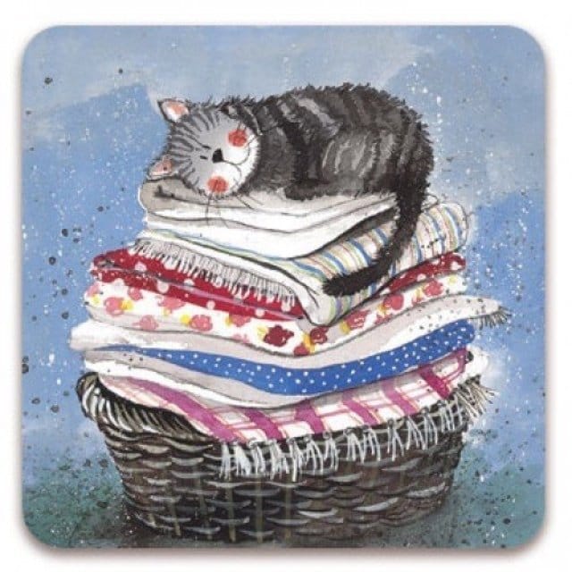 Alex Clark Laundry Basket Cat single cork-backed coaster featuring a sleeping grey tabby cat curled up on a stack of freshly folded laundry in a wicker basket with blue watercolour background.